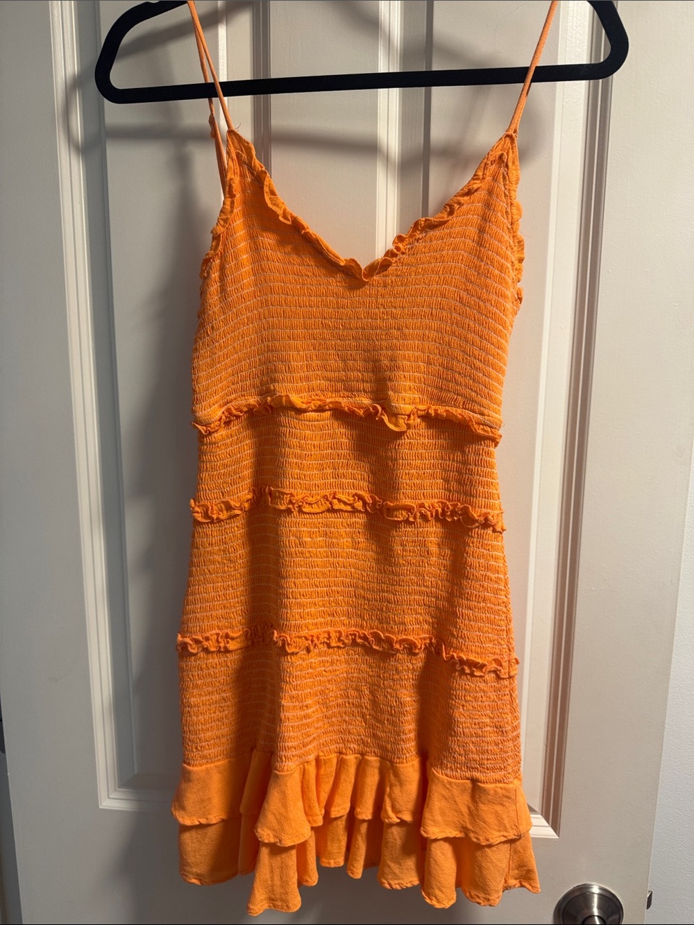 Karlie Orange Ruffled Smocked Mini Dress